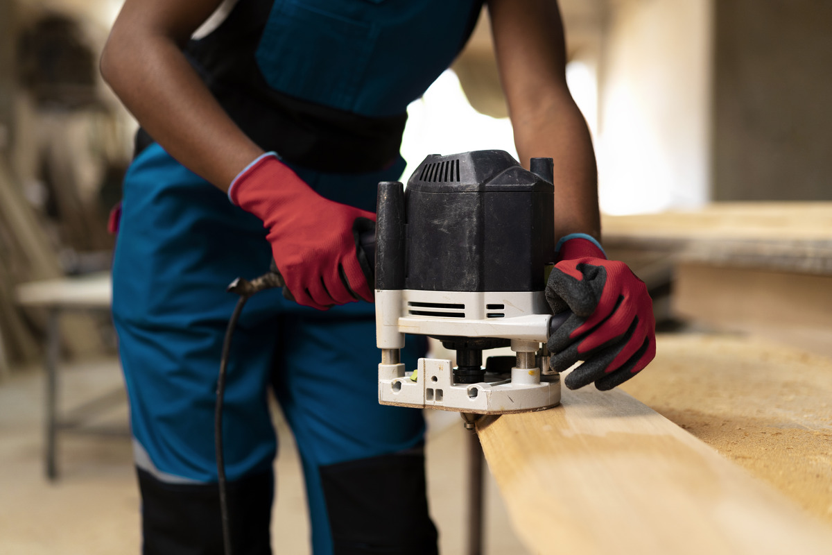 carpenter-cutting-mdf-board-inside-workshop amaris hardware
